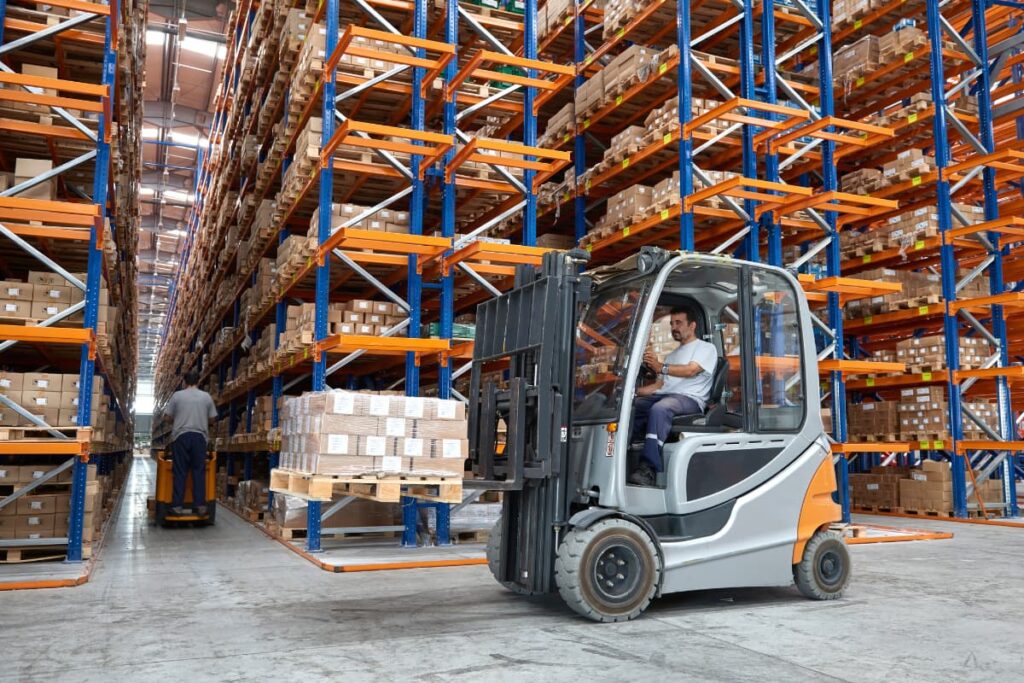 Costco Forklift Driver Operating the powered industrial truck to carry out the parcels and packages inside the warehouse