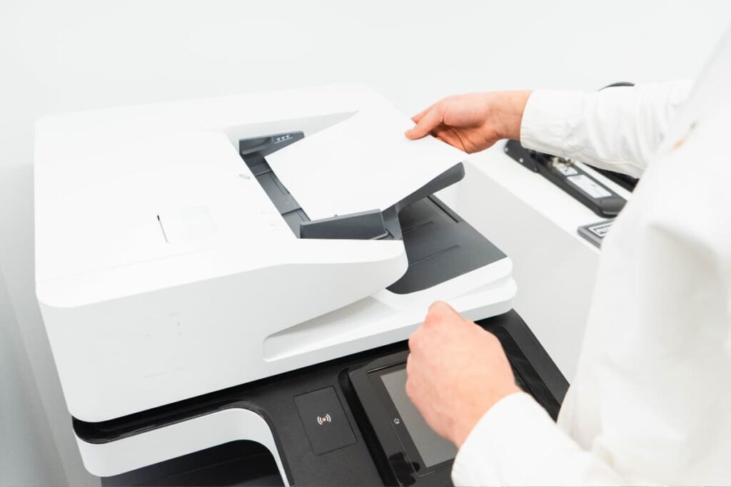 Walmart Copy Machine used by a person to print the documents at Walmart Store.