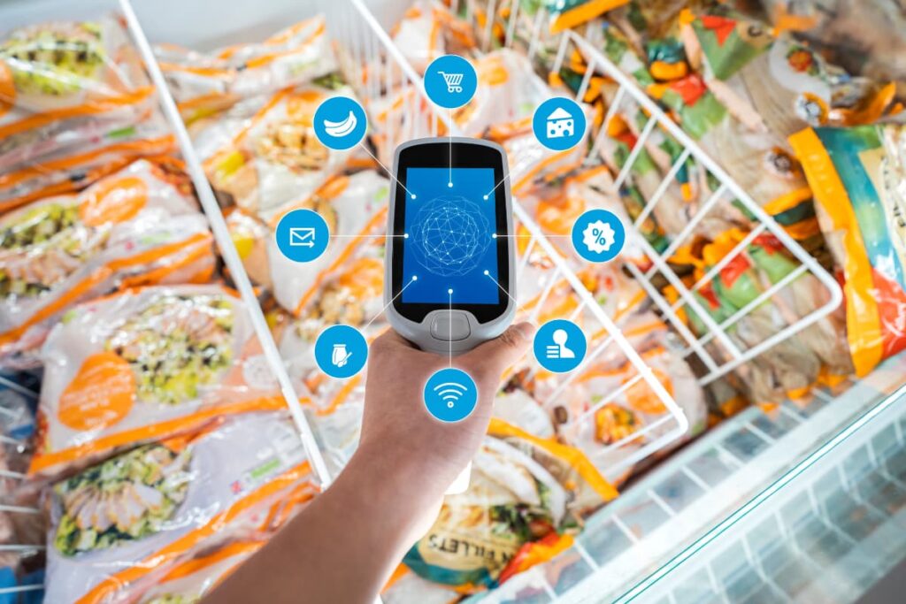 Walmart Scan and Go app used to scan products like grocery items, fruits and vegetables in a cart at Walmart store.