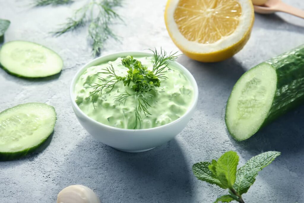Burger King Zesty Sauce is made of cucumber, lemon and pudina grind. Zesty Sauce can be served in a small white color bowl, and garnishing with pudina and Basil.