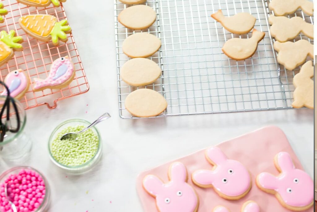 Walmart Sugar Cookies served with a different shapes like strawberry, fish, egg, micky mouse in a steel serving plate with pink and green color  sprinkles.