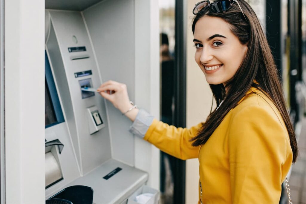 At Walmart Coin Machine a women who was wore a  yellow color t shirt convert her coins into electronic money. 