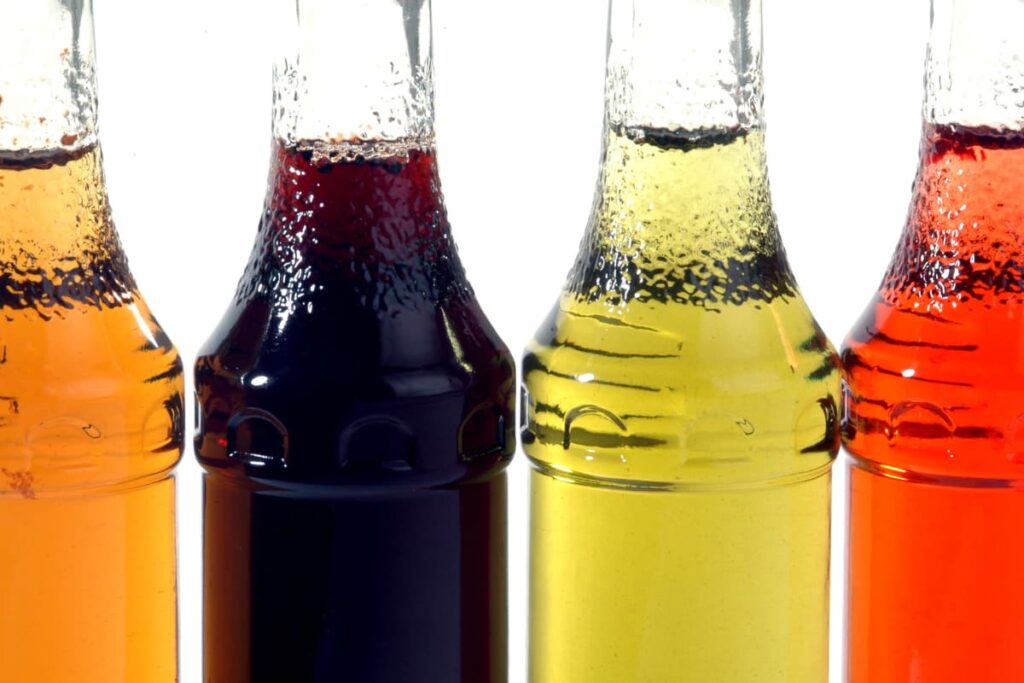 Starbucks Sugar Free Syrups are available in glass bottles. These Sugar free syrups comes in different flavors with different colors(Orange, Black, Yellow, and Red) in different glass bottles. 