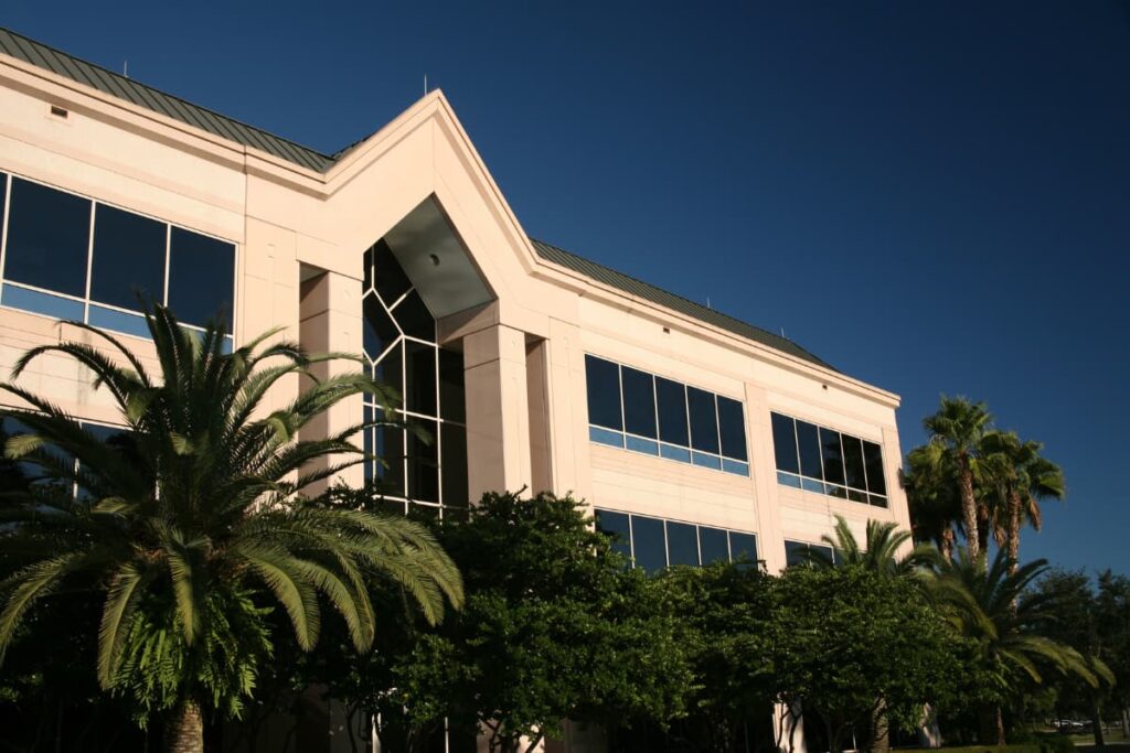 Headquarters  of Publix Located at Florida with lot of palm trees in front of the Company.