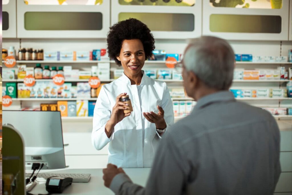 Pharmacy at Safeway giving prescribed medicines to a person by pharmacist at the store.